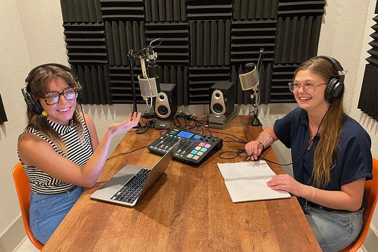 Courtney And Hannah Podcasting Meeting Space