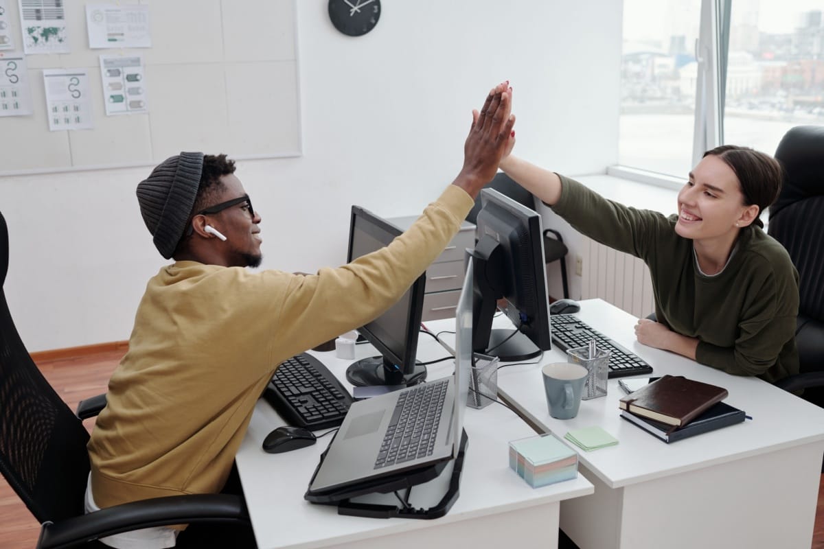 A well-organized coworking environment featuring quiet zones and meeting rooms tailored for maximum focus and efficiency.